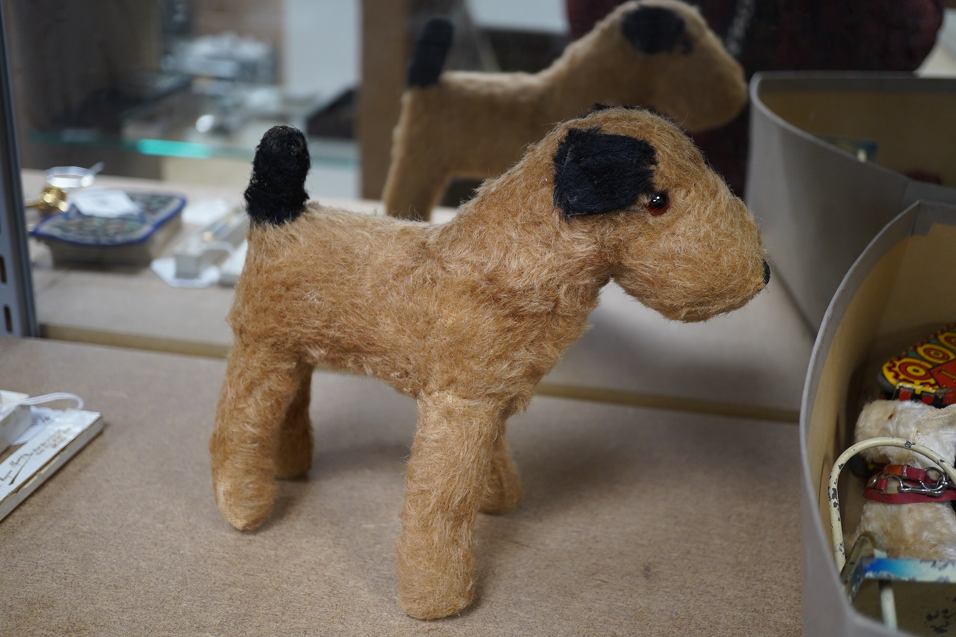 A group of various tinplate and other toys including Britains and Dinky and a 20th century straw filled dog. Condition - poor to fair